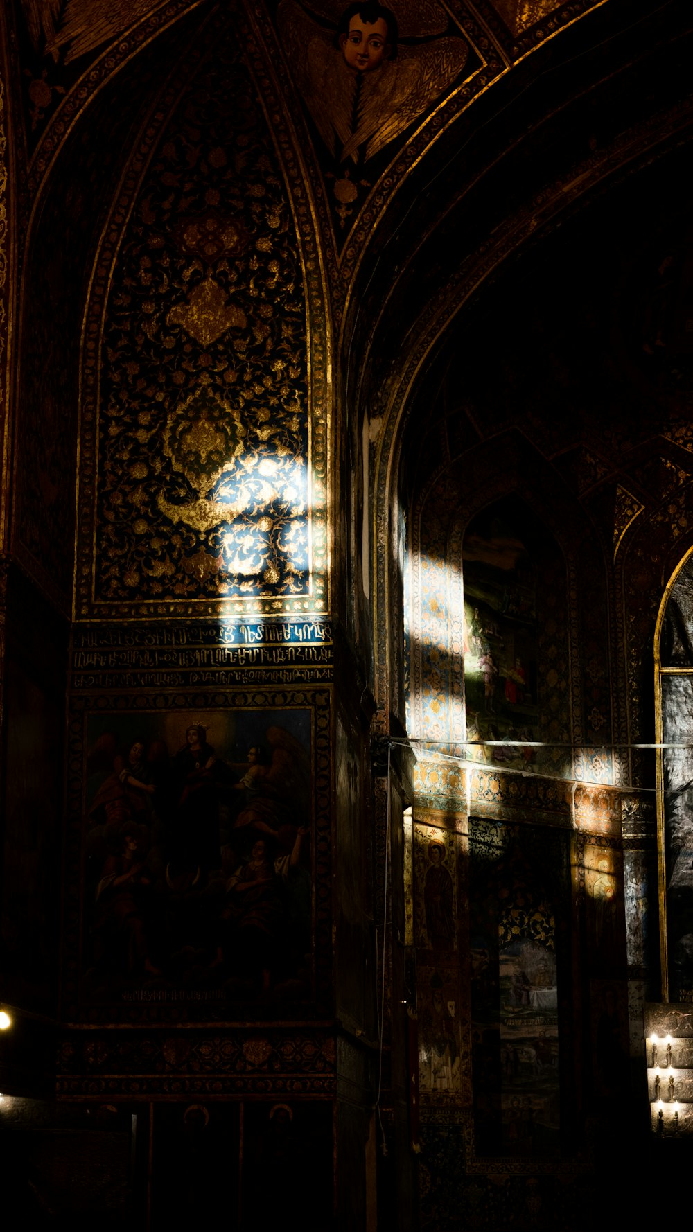 the sunlight is shining through the stained glass window