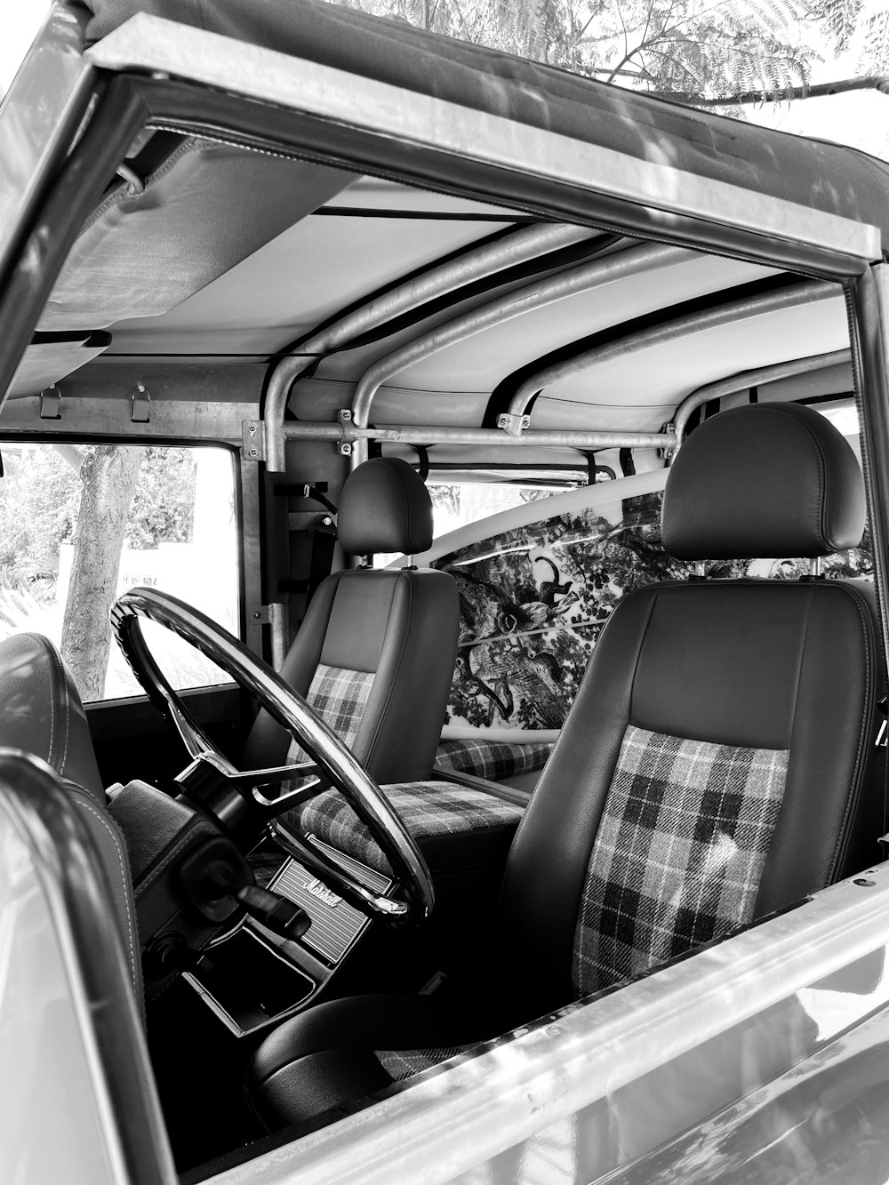 a black and white photo of the inside of a vehicle