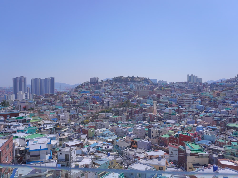 a view of a city from the top of a hill