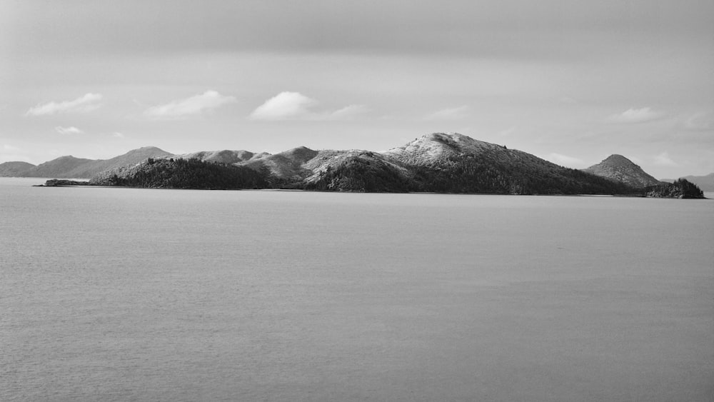 a large body of water surrounded by mountains