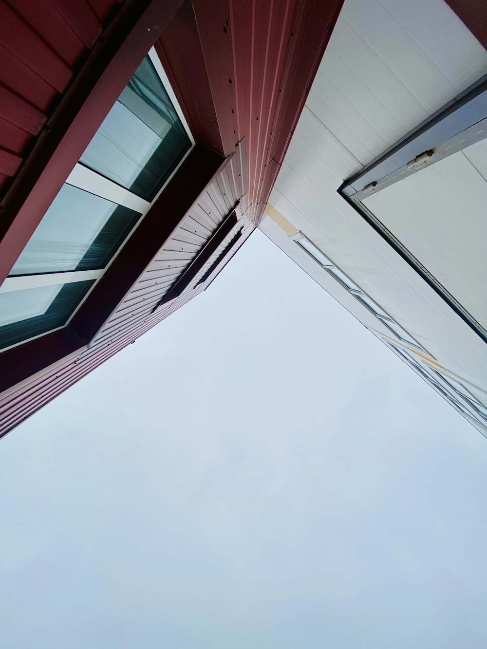 a view looking up at the roof of a building