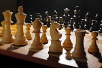 a chess board with a lot of chess pieces on it
