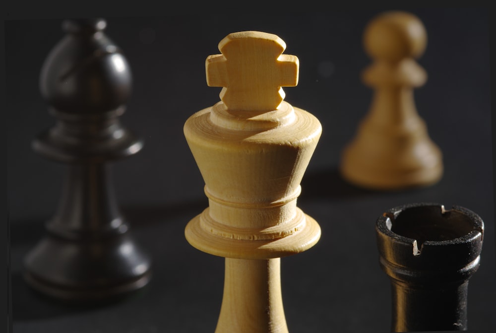 a close up of a chess set on a table