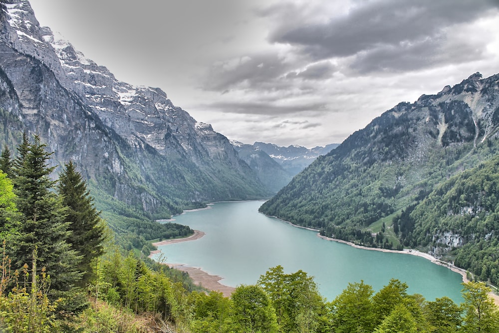 a view of a lake surrounded by mountains