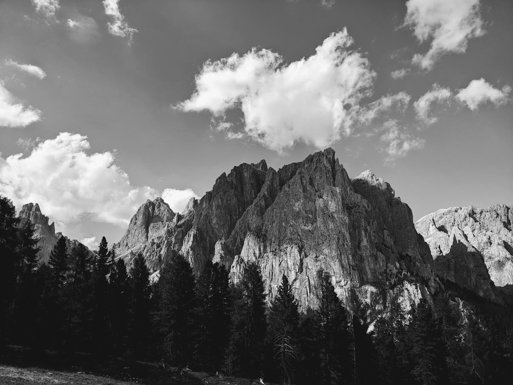 a black and white photo of a mountain range