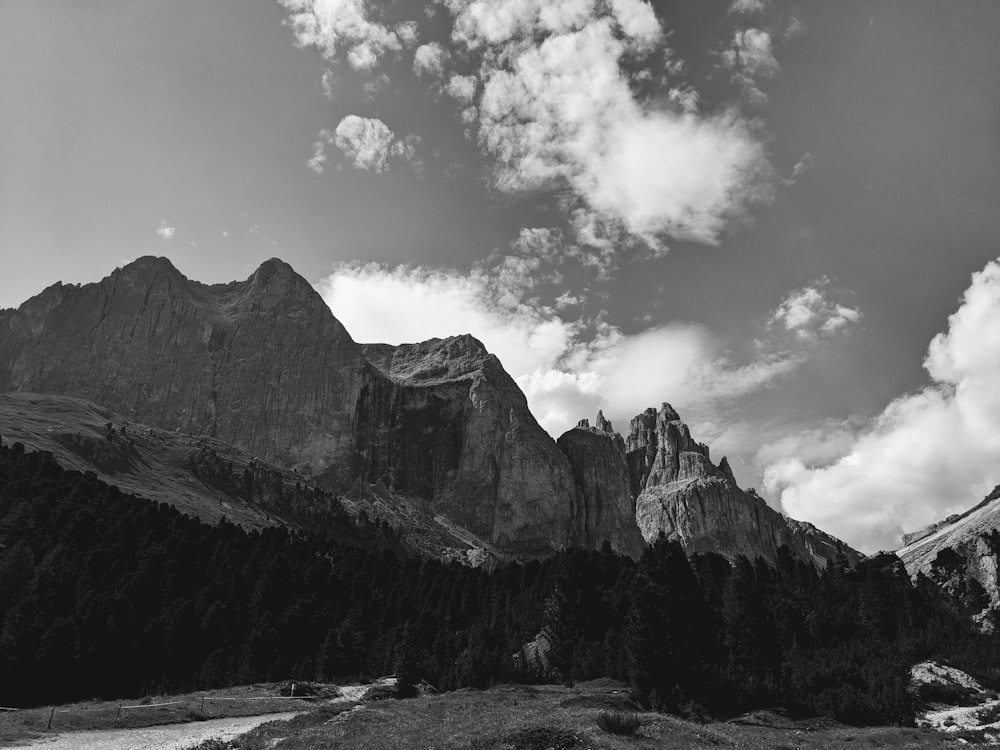 a black and white photo of a mountain range