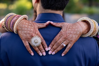 a man and woman with their hands on each other