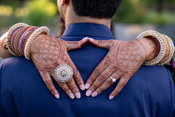 a man and woman with their hands on each other
