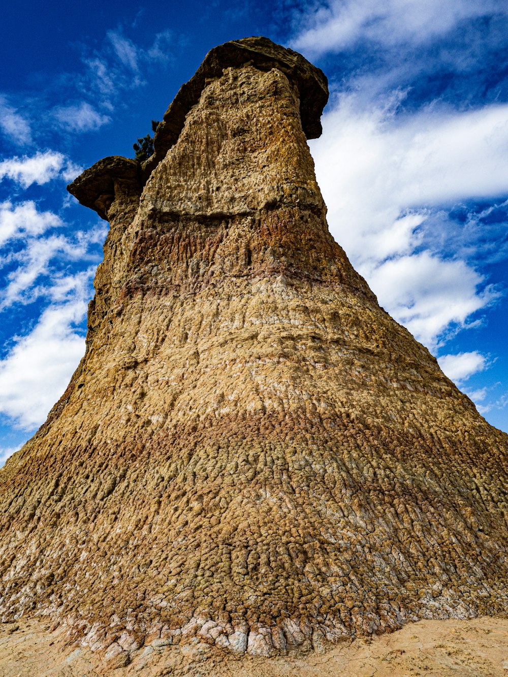 a very tall structure with a sky in the background