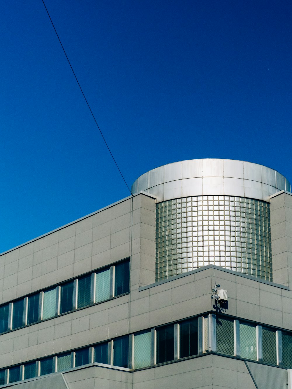 a building with a clock on the side of it