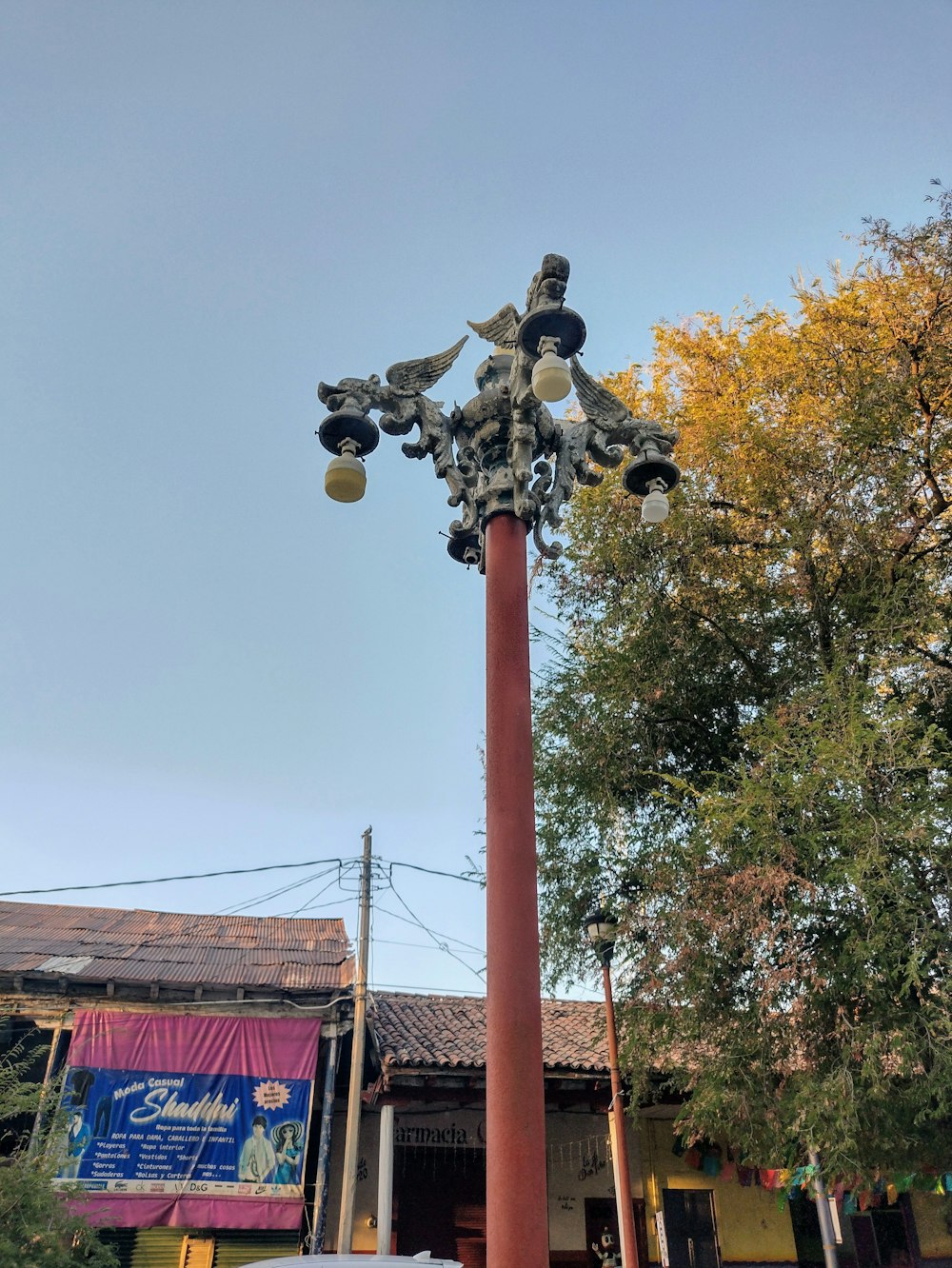 a tall pole with a bunch of lights on top of it