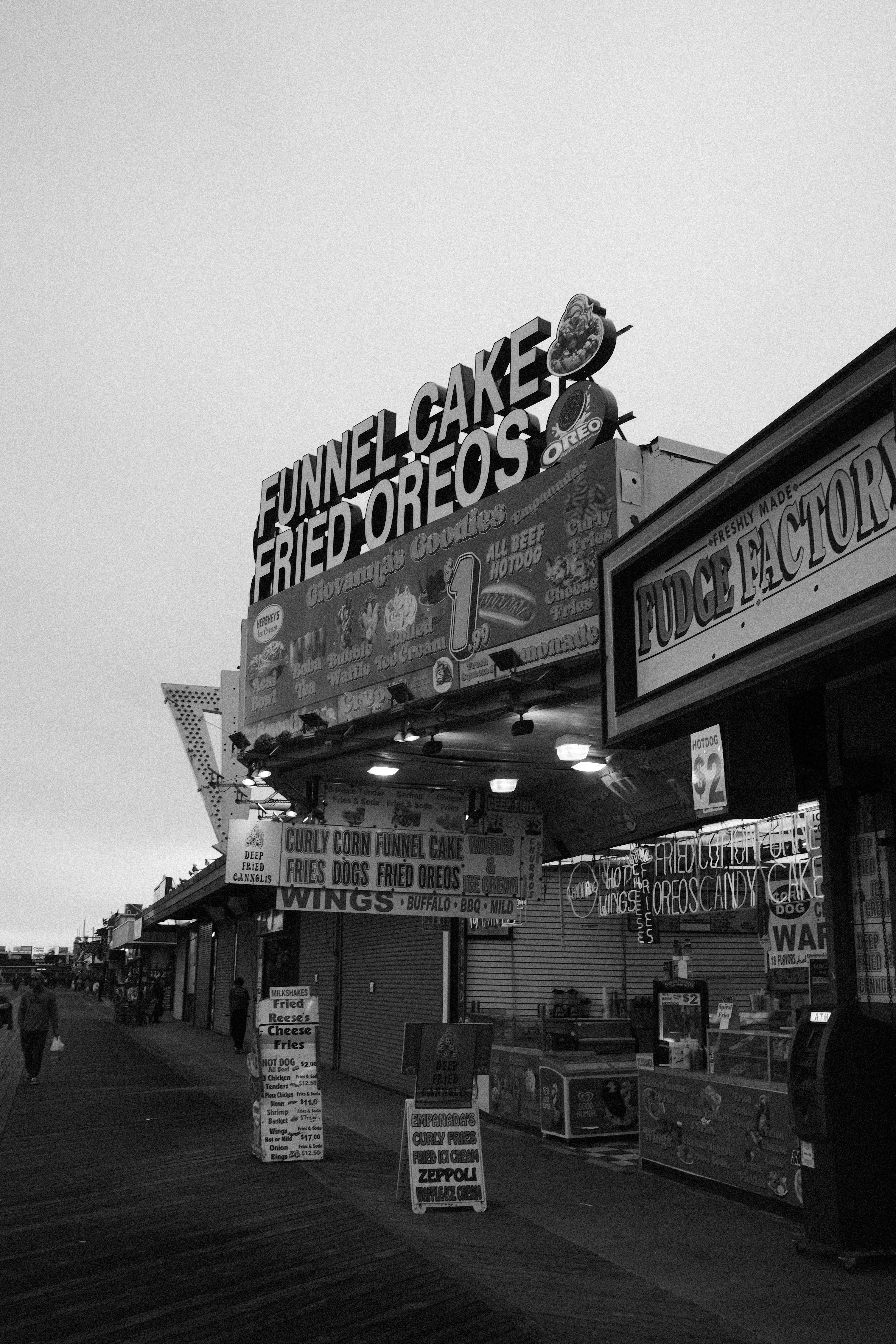 a black and white photo of a store front