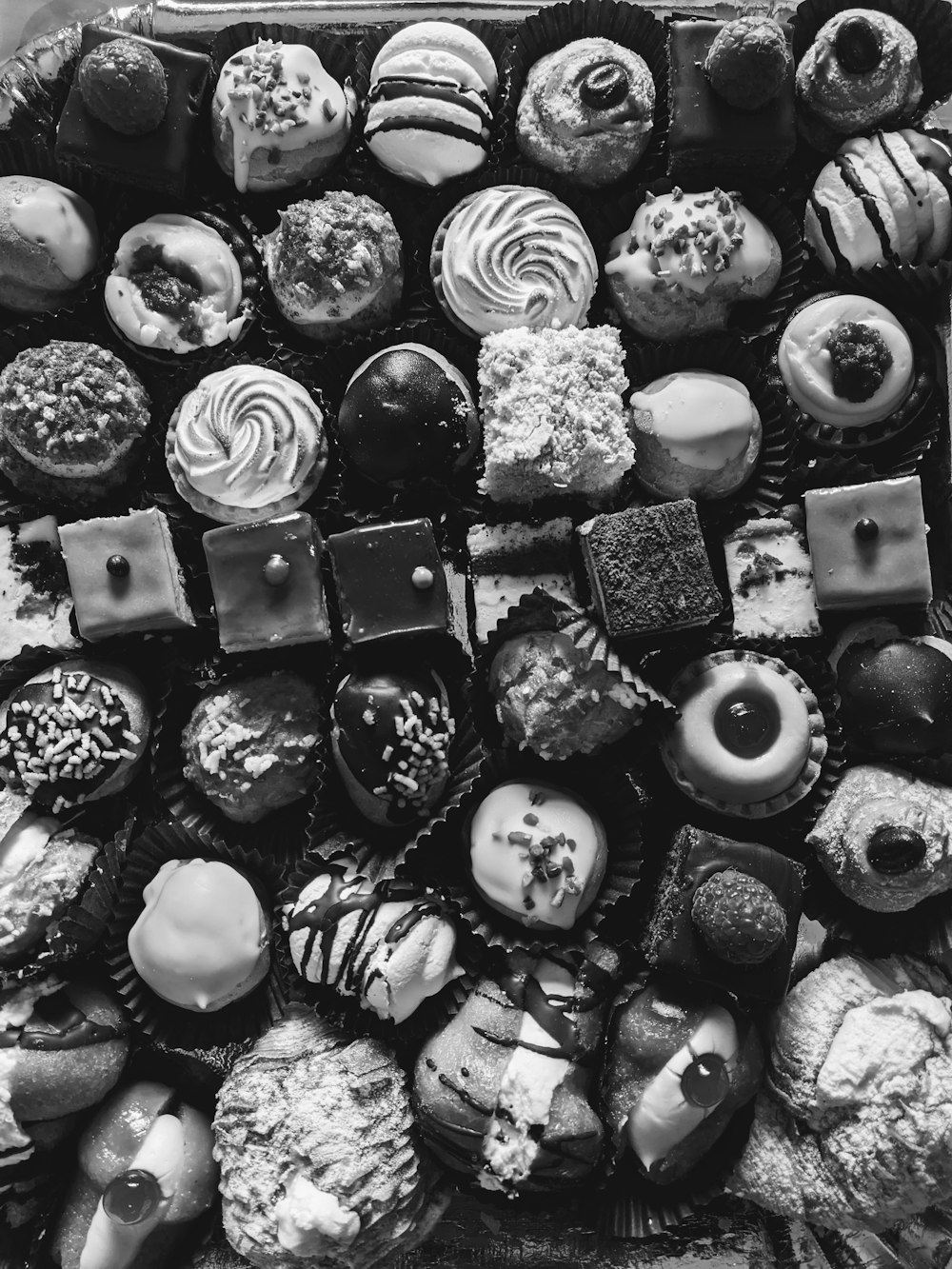 a box filled with lots of different types of donuts