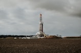 a drilling rig in the middle of a field