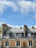 a building with a clock on the front of it