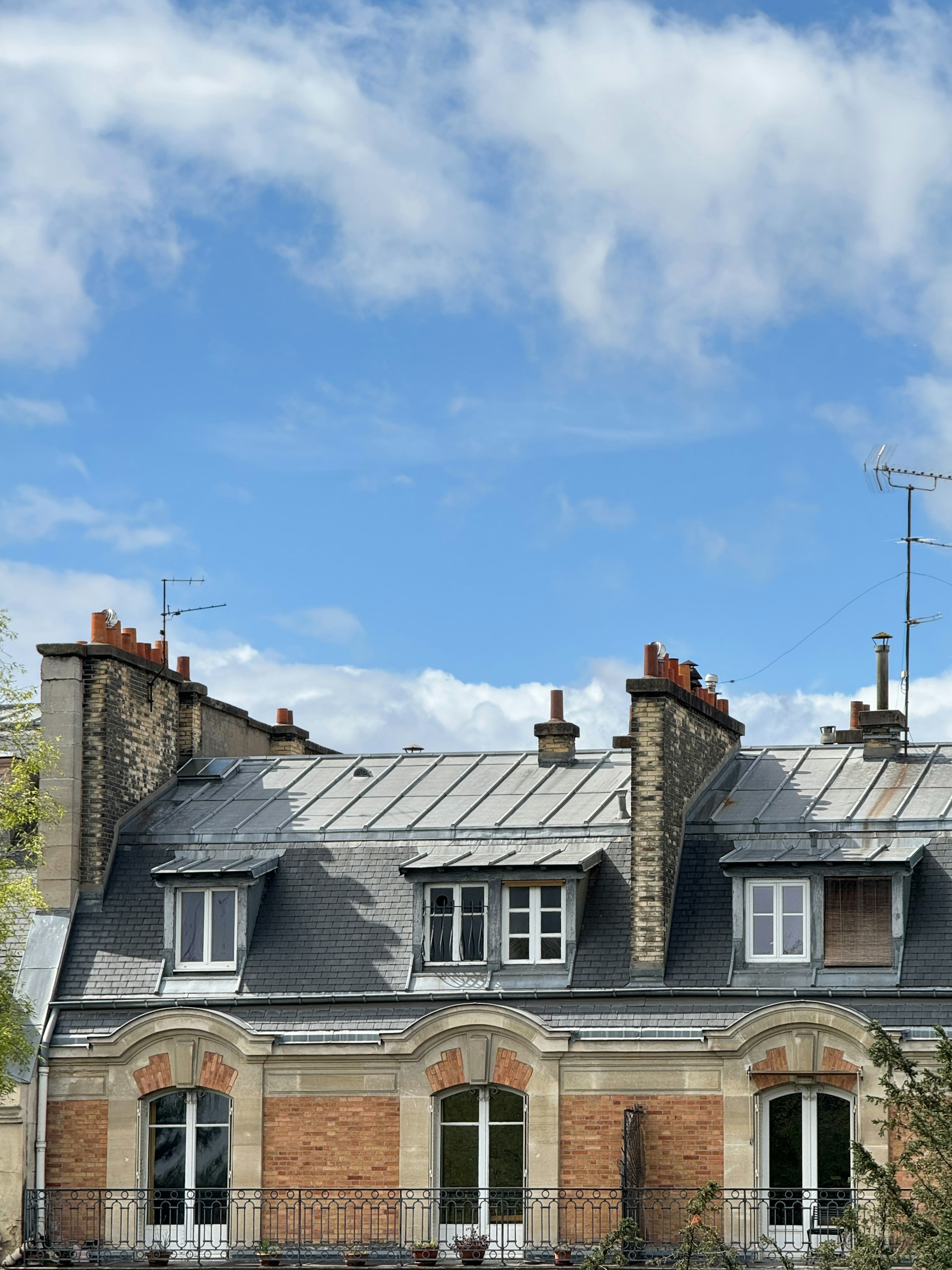 a building with a clock on the front of it