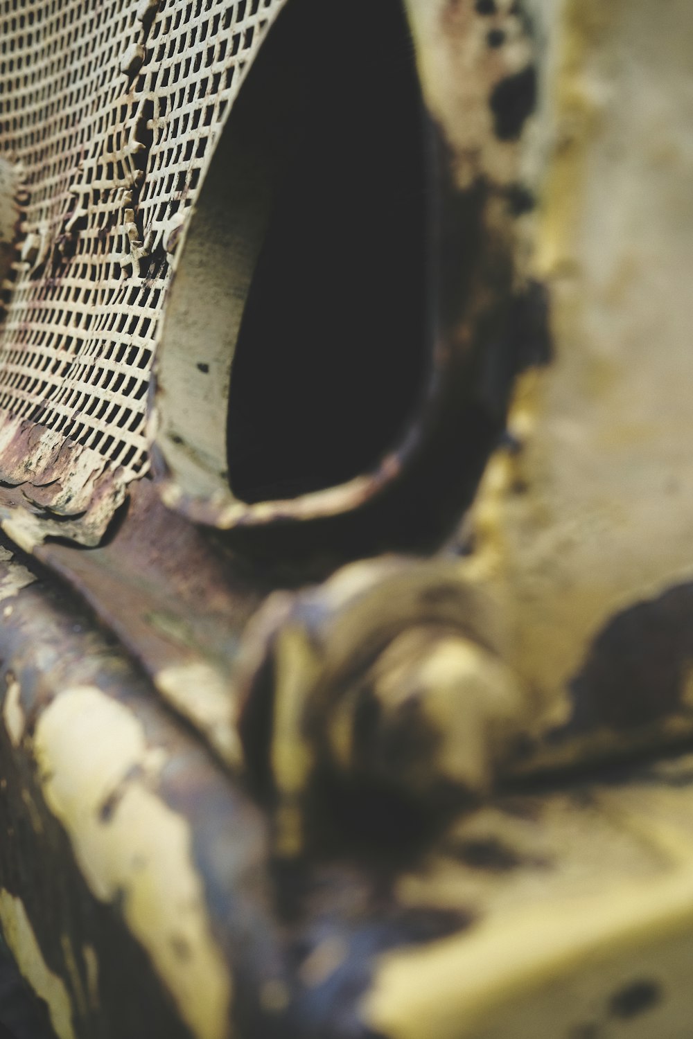 a close up of a rusted metal object