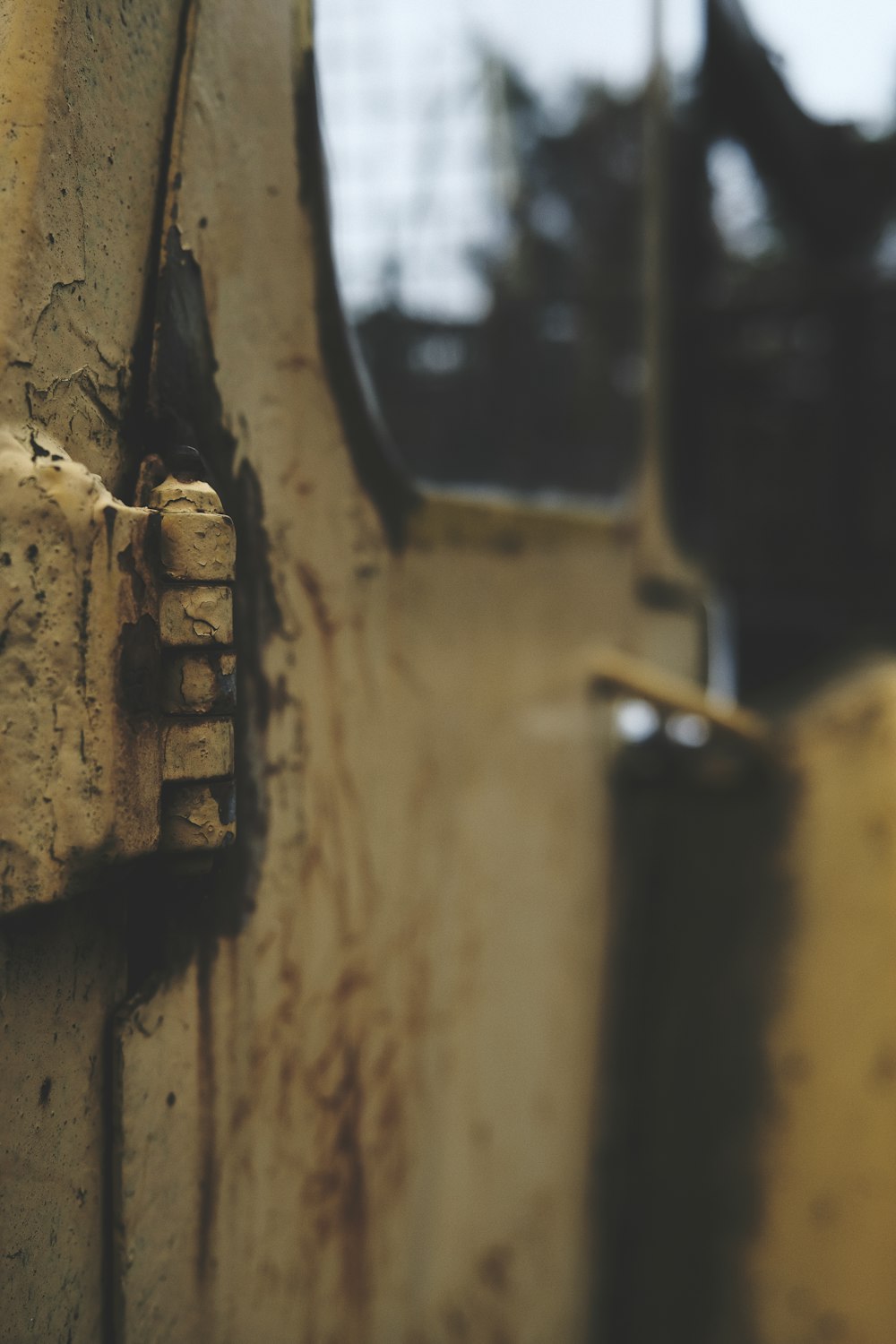 a close up of a rusted door handle