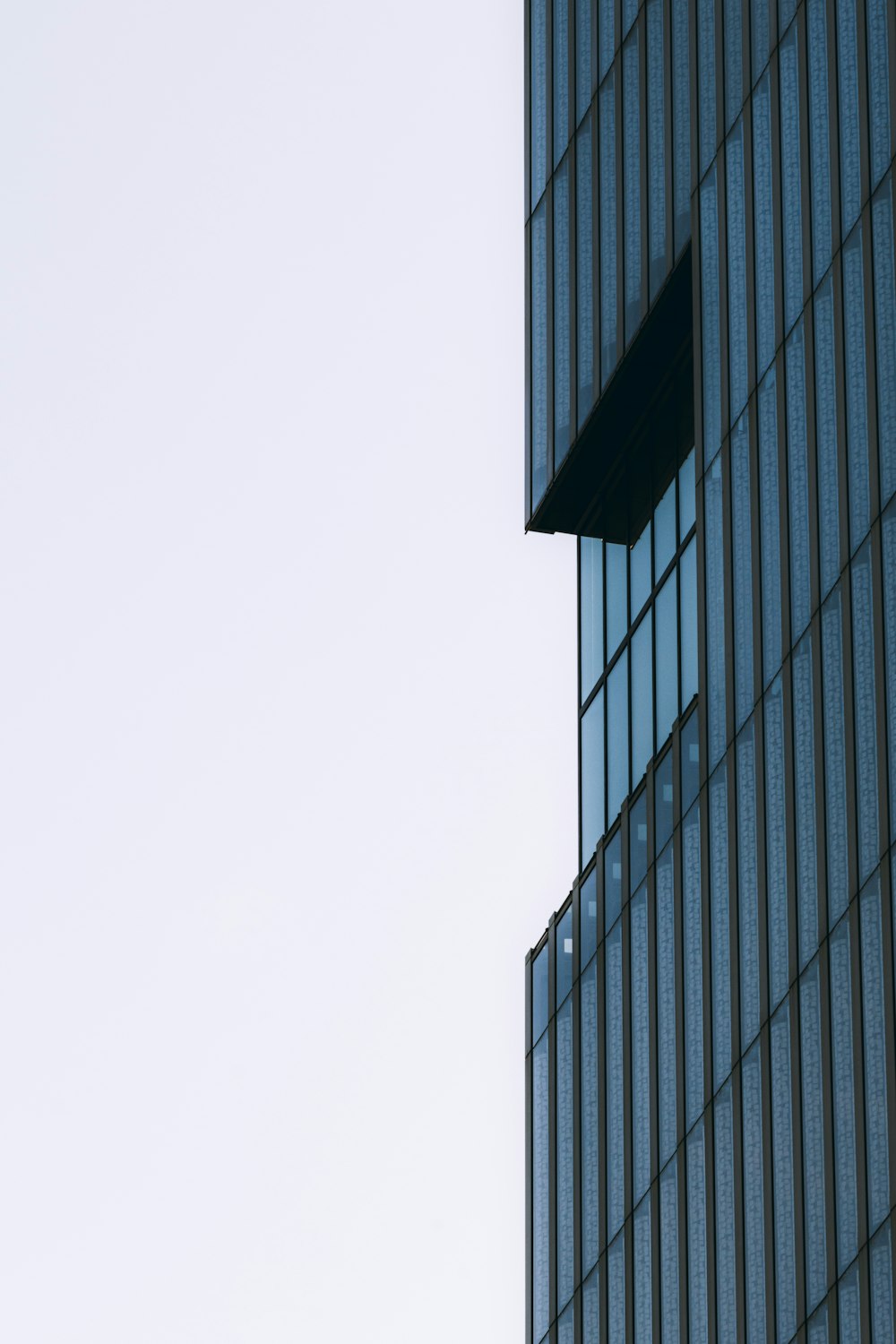 a tall building with a clock on the side of it