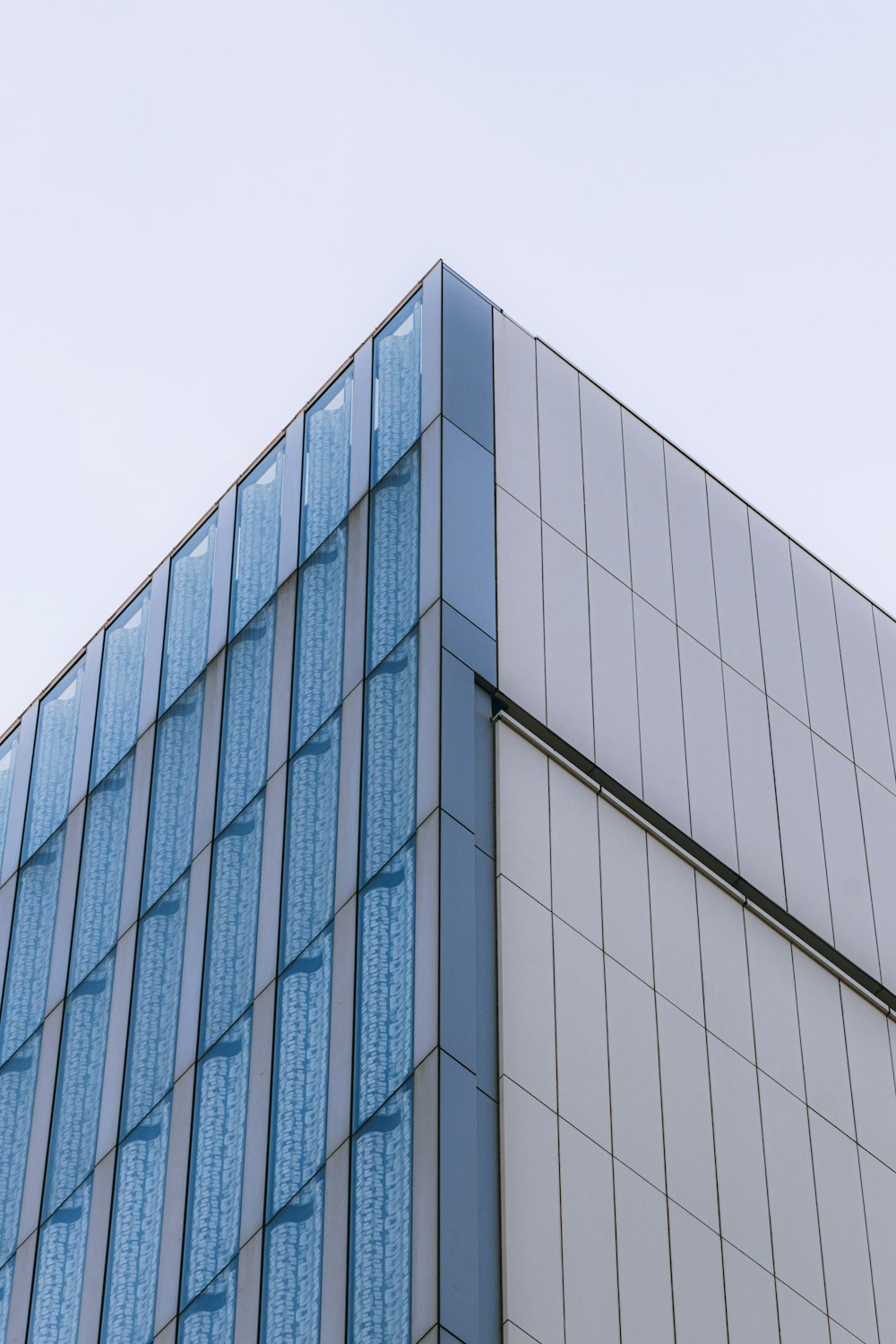 a tall building with a clock on the side of it