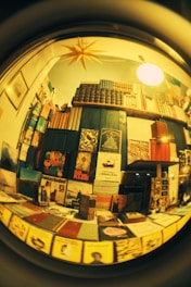a view of a bookshelf through a magnifying glass