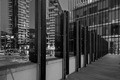 a black and white photo of a city at night