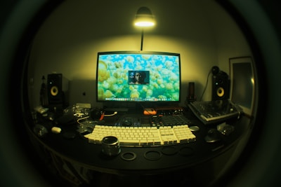 a computer monitor sitting on top of a desk