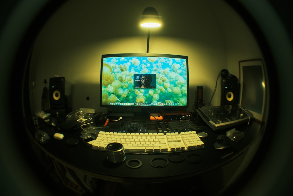 a computer monitor sitting on top of a desk