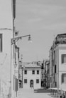 a black and white photo of a city street
