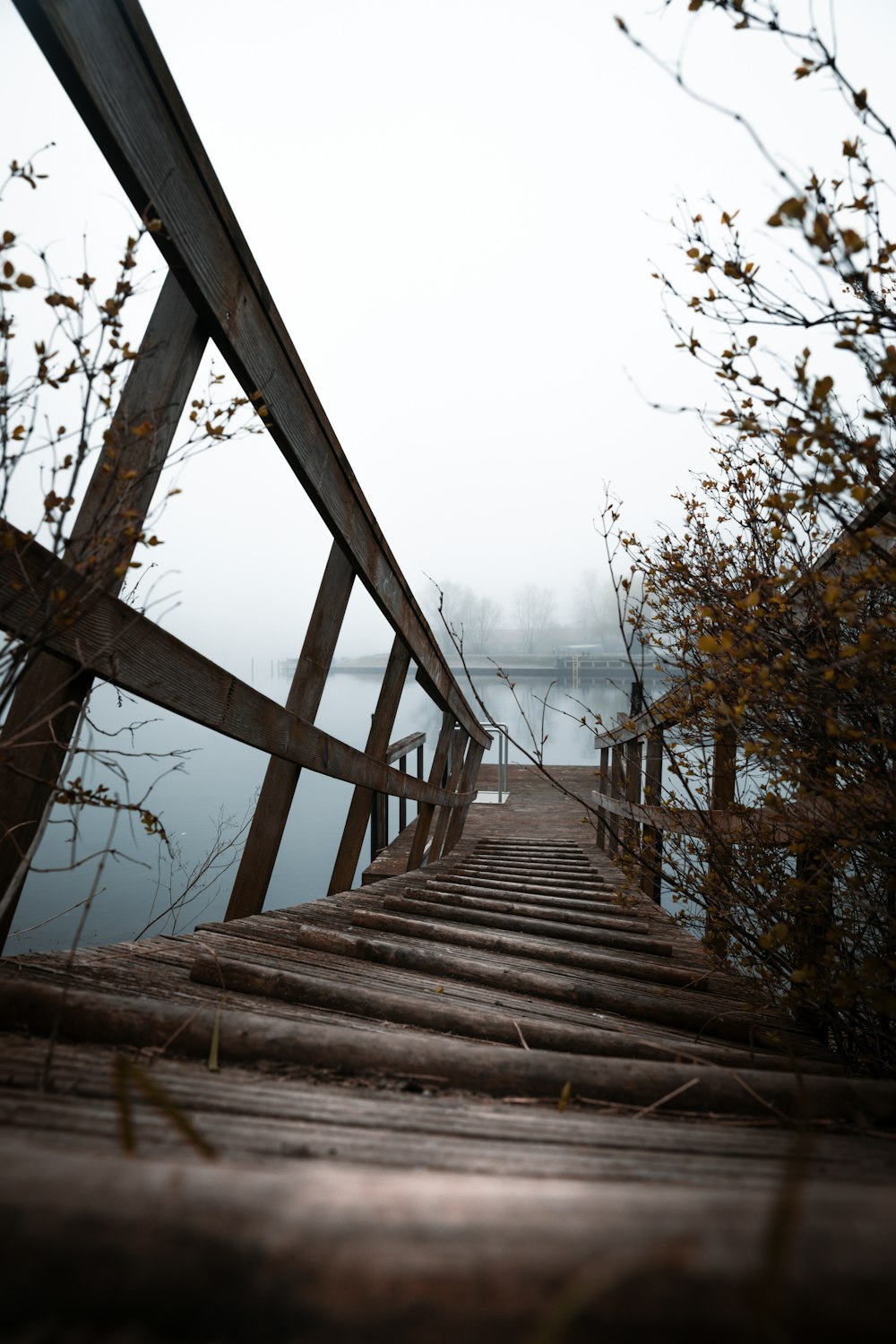 a wooden bridge over a body of water