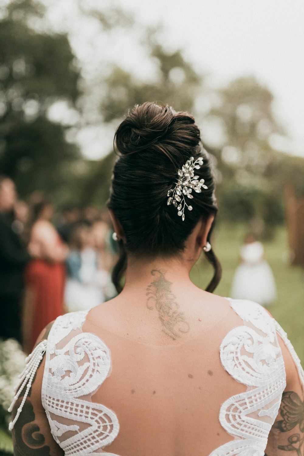 a woman with a tattoo on her back