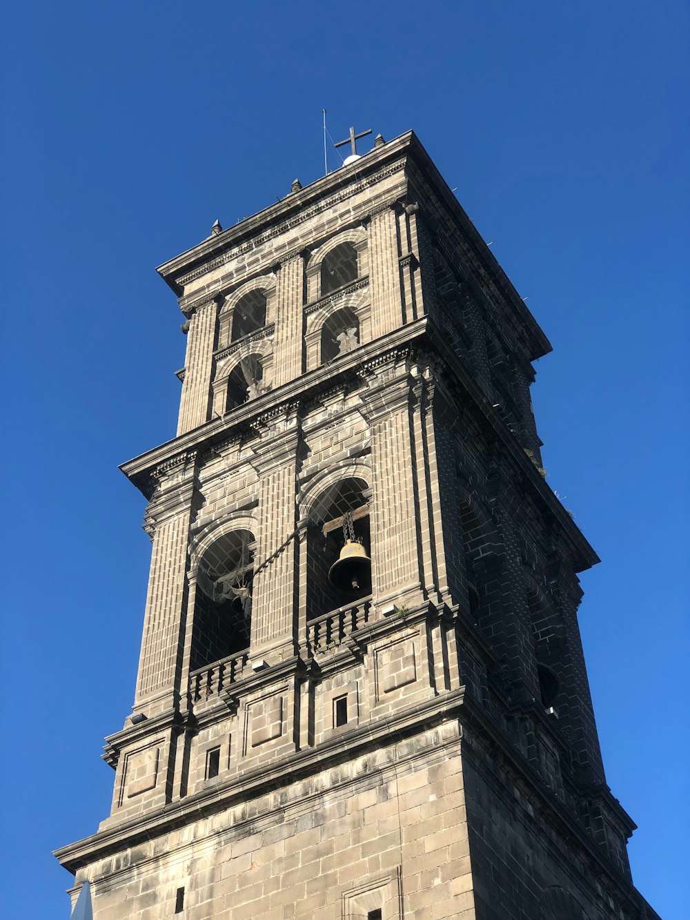 a tall clock tower with a sky background