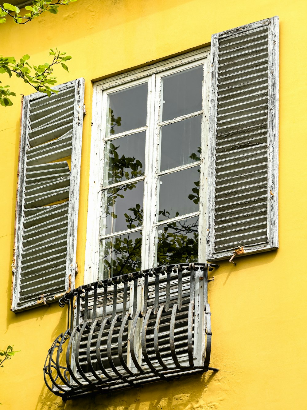 a yellow building with a bunch of windows