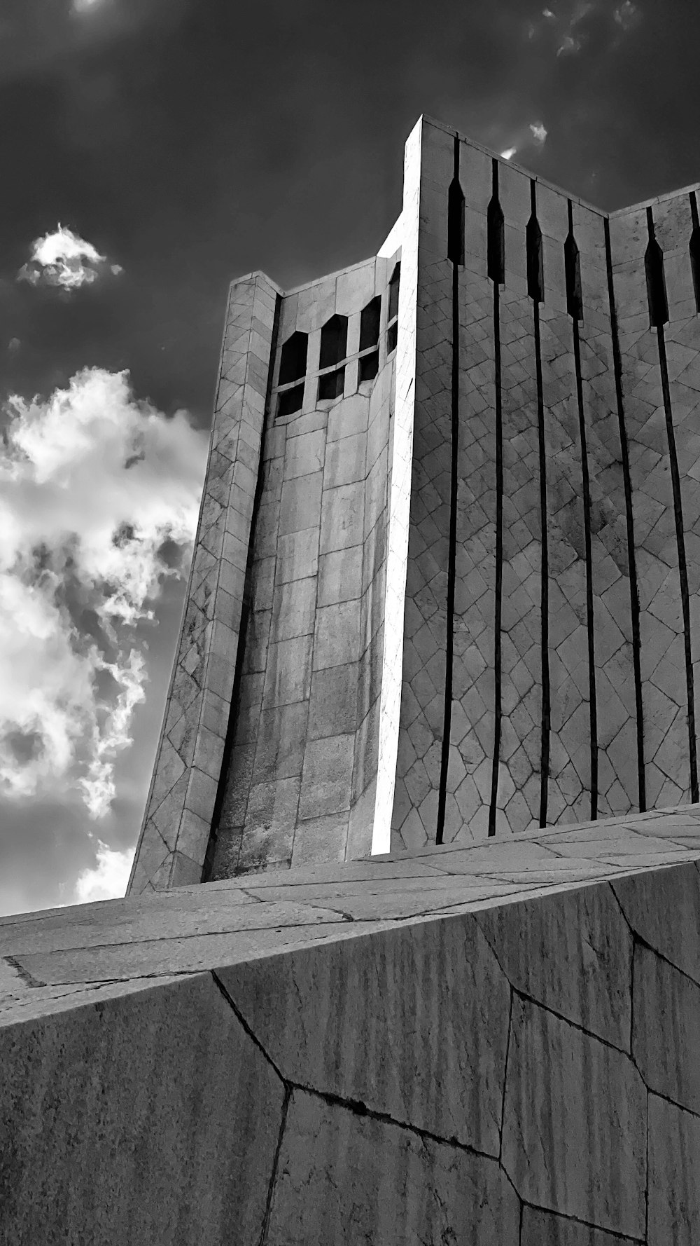 a black and white photo of a concrete structure