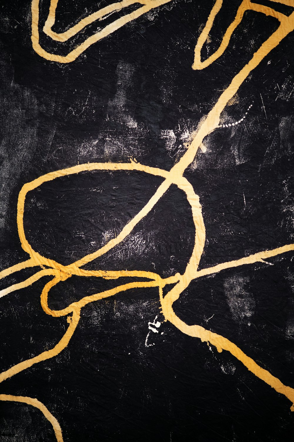 a black and yellow painting with yellow lines