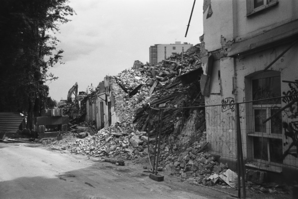 a black and white photo of a demolished building