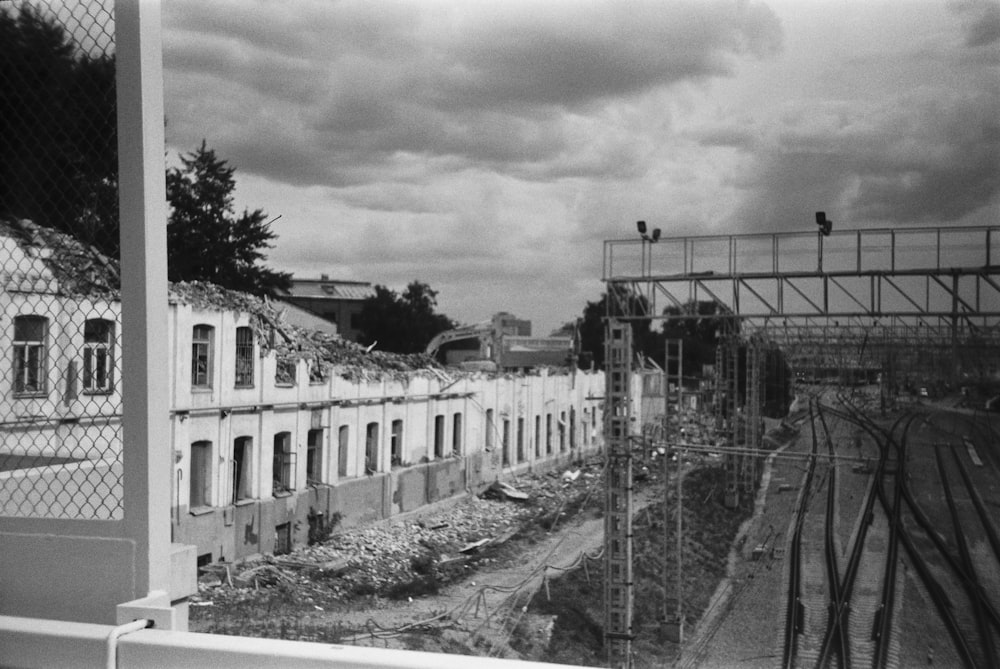 a black and white photo of a building under construction