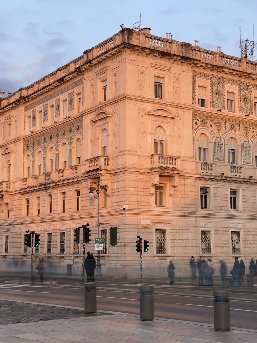 a large building sitting on the side of a road