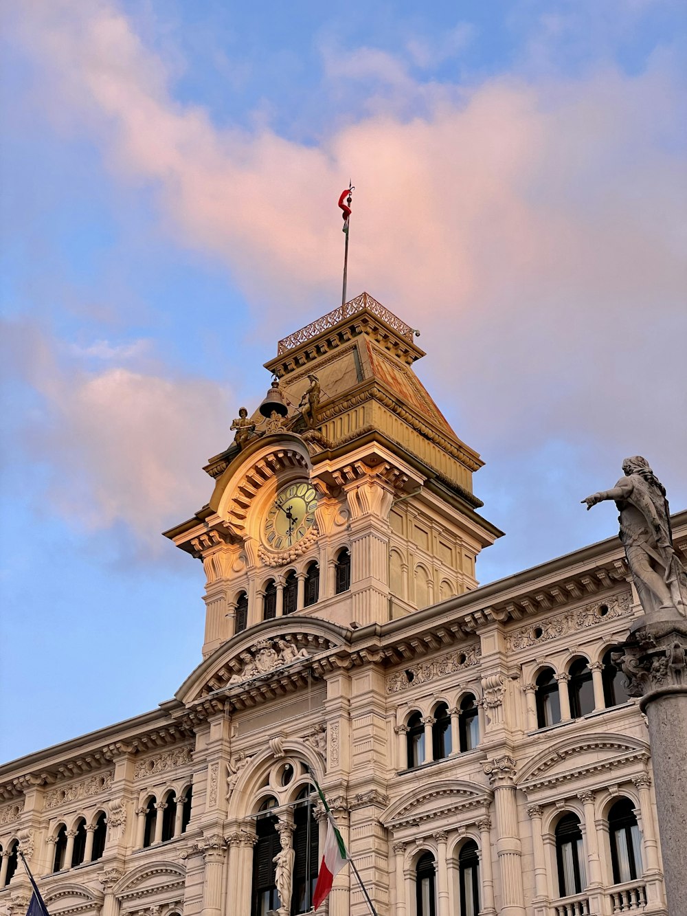 a tall building with a clock on the top of it