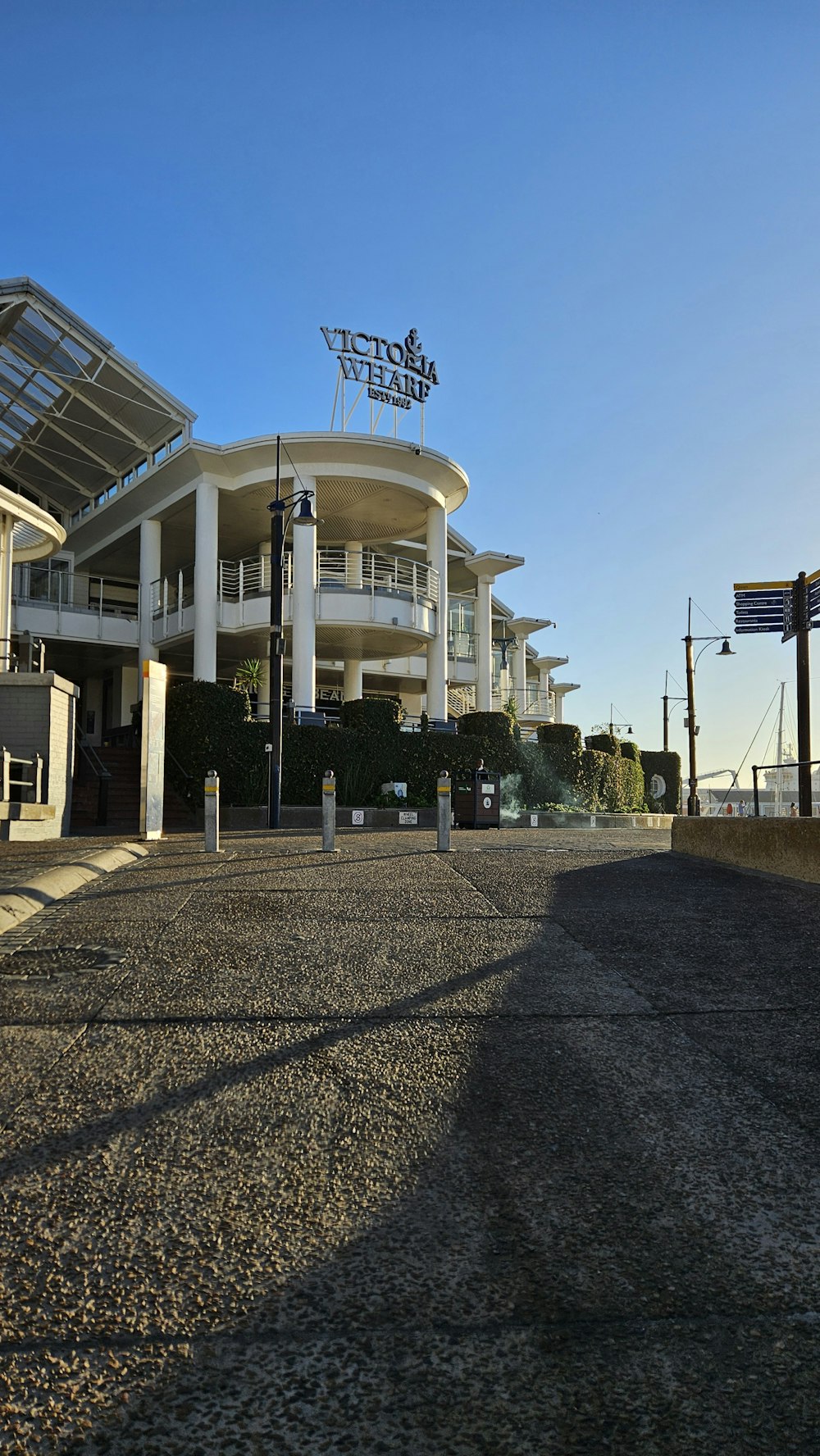 a large white building with a sign on top of it