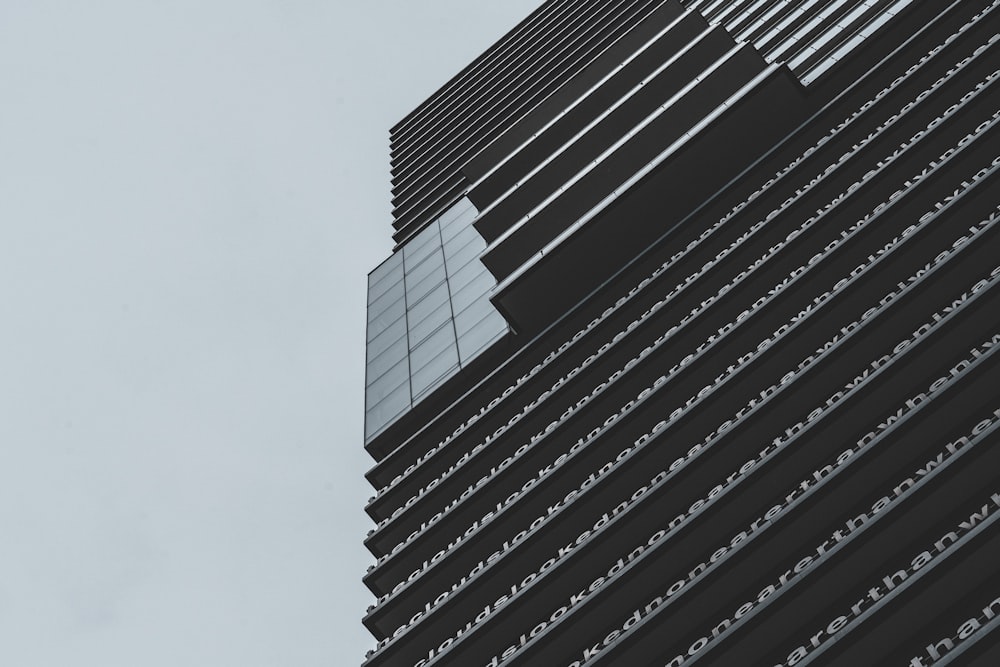 a very tall building with a sky in the background