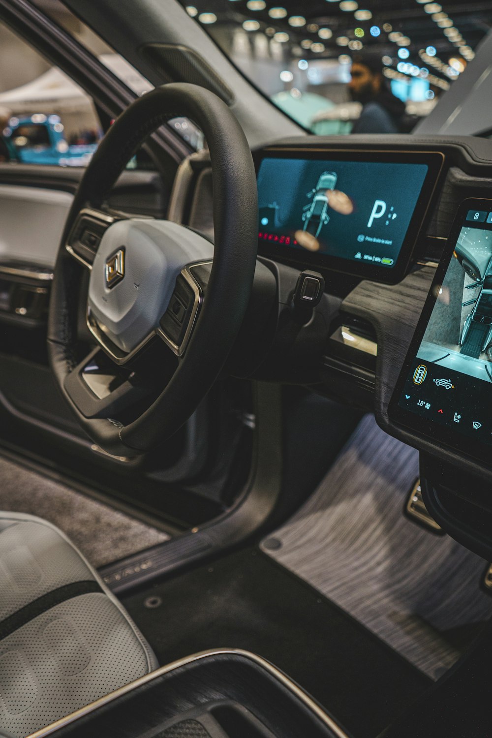 a picture of a car dashboard with a steering wheel