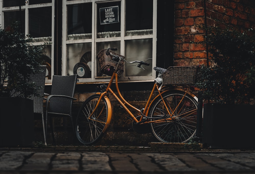 a bicycle parked in front of a building