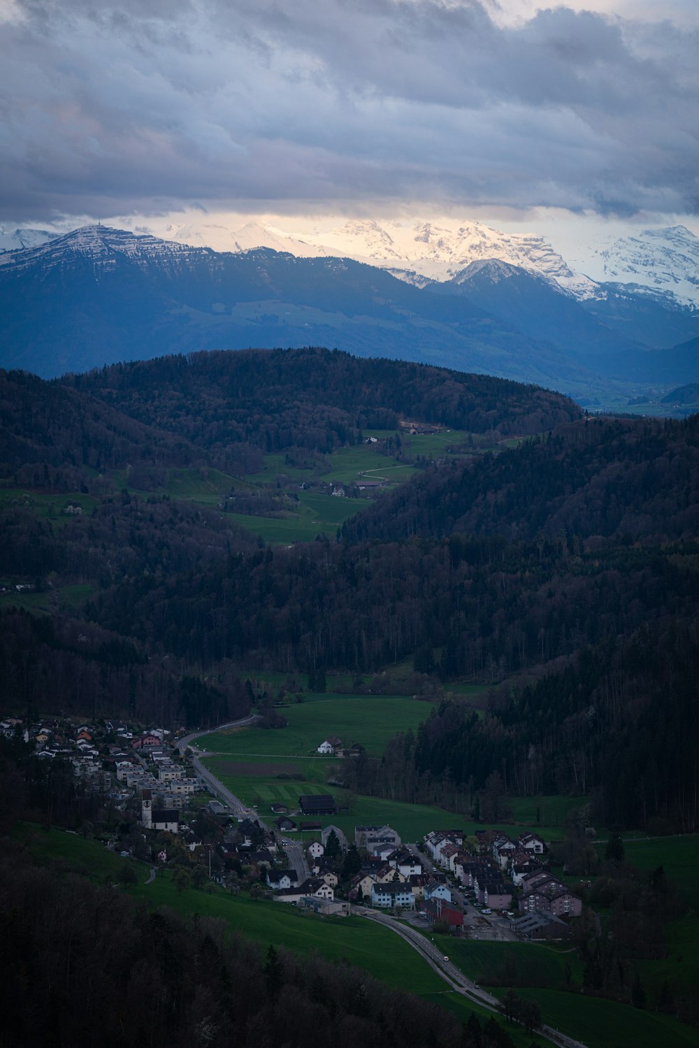 a view of a town in the middle of a valley