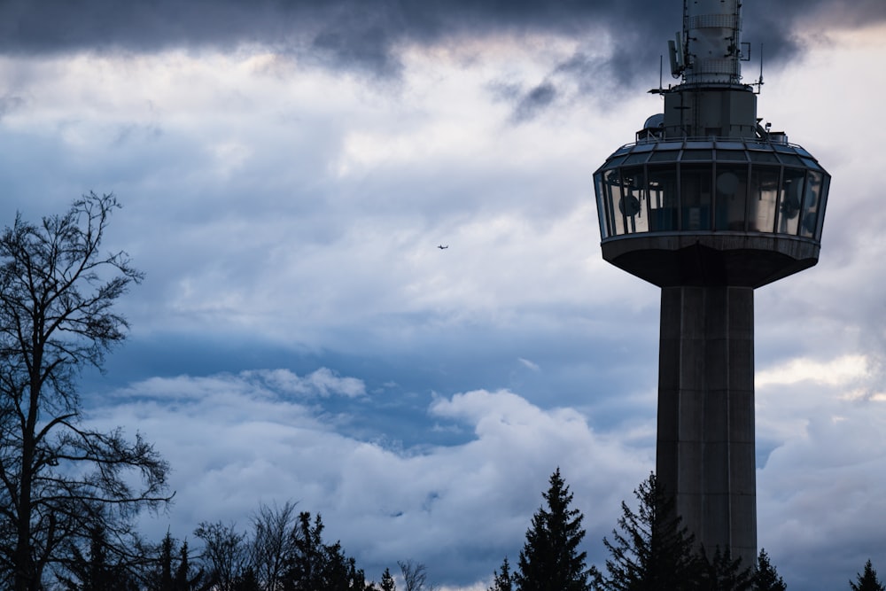 a very tall tower with a light on top of it