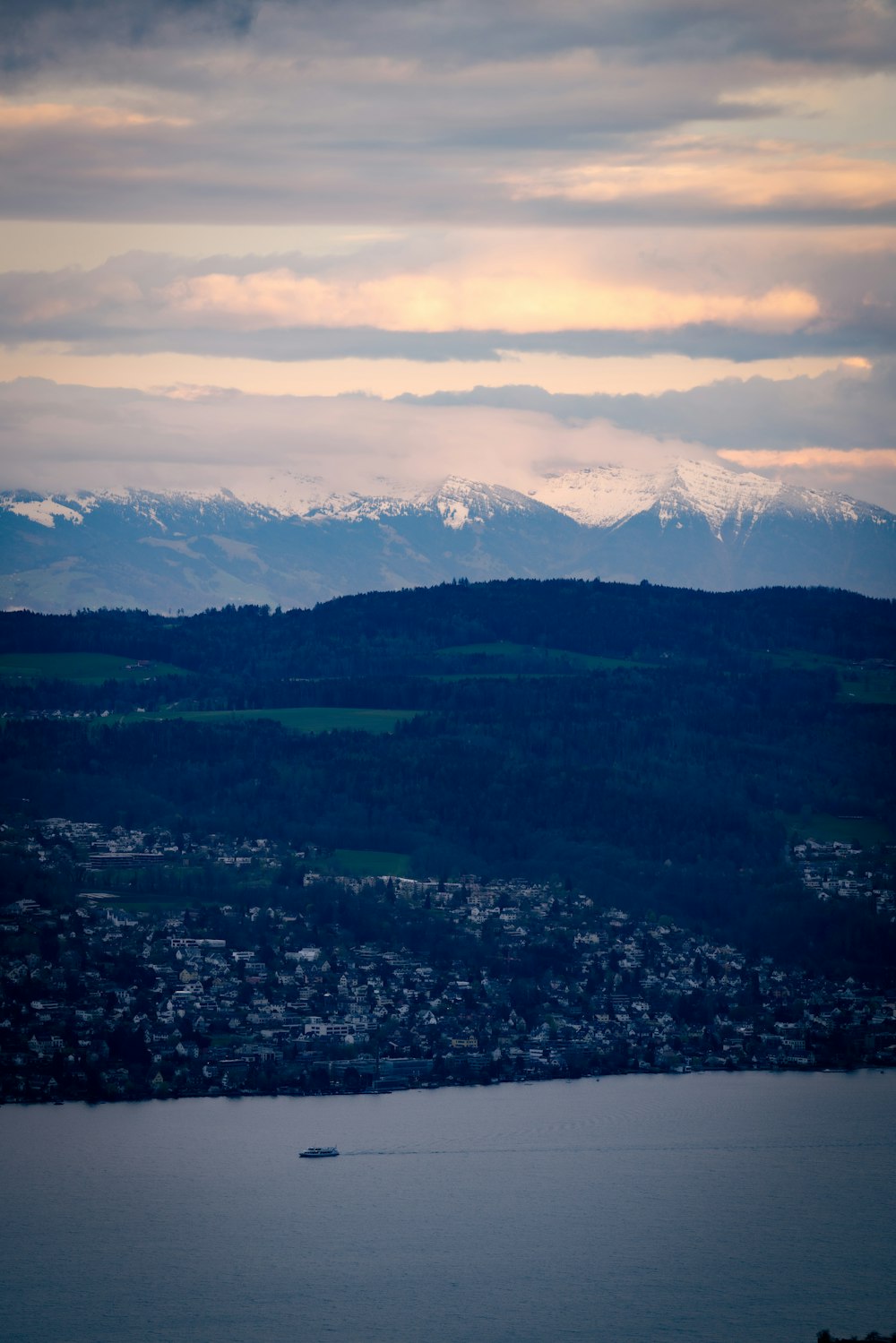 a view of the mountains and a body of water