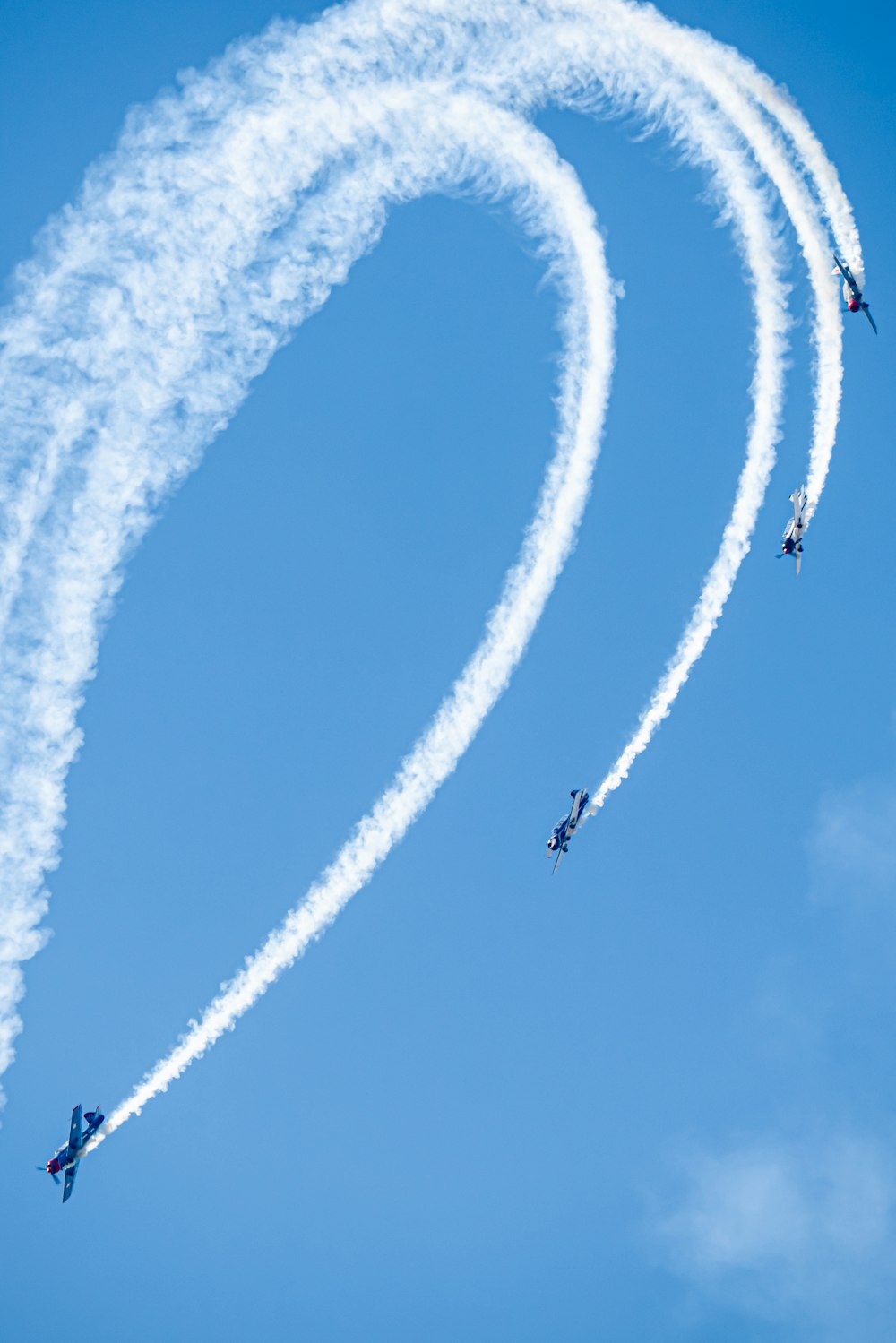 a group of airplanes flying in formation in the sky