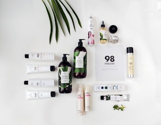 a white table topped with lots of skin care products