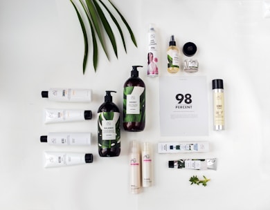 a white table topped with lots of skin care products