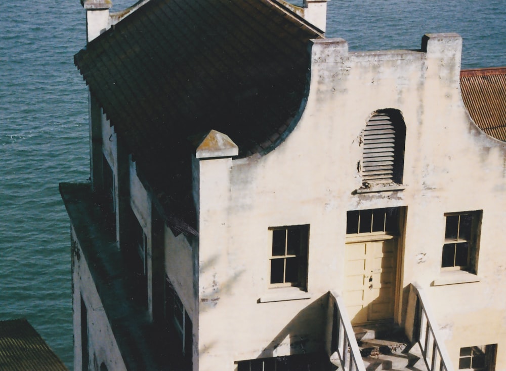 an aerial view of a building with stairs leading up to it